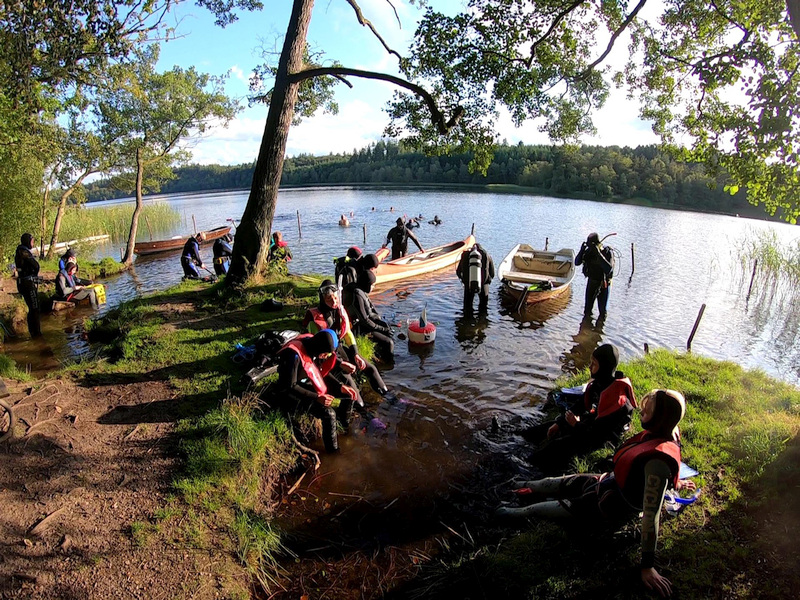 Divers preparing to dive on a beautiful summer day